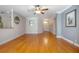 Spacious living room with hardwood floors, crown molding, and an open layout at 215 Coleton Ln, Deland, FL 32724