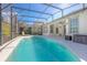 Beautiful screened-in pool and patio area, perfect for outdoor entertaining and relaxation at 215 Coleton Ln, Deland, FL 32724