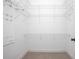 Walk-in closet with metal shelving on all sides at 215 Coleton Ln, Deland, FL 32724