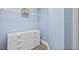 Walk-in closet with wire shelving, built-in dresser, and ample storage space at 2403 S Atlantic Ave # 209, Daytona Beach Shores, FL 32118