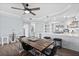 Open concept dining room connected to a stylish kitchen, perfect for entertaining and everyday living at 2403 S Atlantic Ave # 209, Daytona Beach Shores, FL 32118
