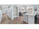 Bright kitchen featuring an island, stainless steel appliances, and modern finishes at 2403 S Atlantic Ave # 209, Daytona Beach Shores, FL 32118