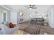 Open concept living space featuring modern furnishings and access to the kitchen at 2403 S Atlantic Ave # 209, Daytona Beach Shores, FL 32118