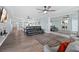 Open-concept living space featuring modern furnishings and access to the kitchen at 2403 S Atlantic Ave # 209, Daytona Beach Shores, FL 32118