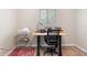 Functional home office space with a desk, chair, and storage for efficient work at 2471 Harvard Rd, Deland, FL 32724