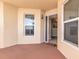 Balcony featuring neutral colored walls, tiled floor, and sliding glass door at 2515 S Atlantic Ave # 1004, Daytona Beach, FL 32118