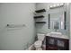 Modern bathroom featuring a vanity sink and shelving at 2639 Maitland Crossing Way # 103, Orlando, FL 32810