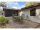 Back patio area with furniture set and enclosed porch area at 270 Sandyhook Ln, Deland, FL 32724