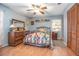 Comfortable bedroom with a ceiling fan and natural light at 270 Sandyhook Ln, Deland, FL 32724
