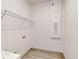 Bright laundry room with ample space for cleaning supplies and storage solutions at 28 Guava Ln, Ocklawaha, FL 32179