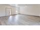 Open-concept living area, perfect for entertaining, with natural light and a welcoming atmosphere at 28 Guava Ln, Ocklawaha, FL 32179