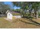 Storage shed on a grassy lot behind the house at 2910 Hardy Ave, New Smyrna Beach, FL 32168