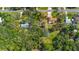 Aerial view showcasing the property's location and surrounding lush greenery at 2918 Hardy Ave, New Smyrna Beach, FL 32168
