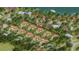 Wonderful aerial perspective of a modern waterfront community offering stunning views from well-designed properties at 2918 Hardy Ave, New Smyrna Beach, FL 32168