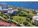 Aerial view of golf course and waterfront condo community at 3 Oceans West Blvd # 1D6, Daytona Beach Shores, FL 32118
