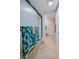 This bathroom features travertine flooring, a glass-enclosed shower, and modern finishes at 3 Oceans West Blvd # 1D6, Daytona Beach Shores, FL 32118