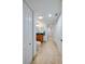 Bathroom with tile floor and vanity between 2 doors at 3 Oceans West Blvd # 1D6, Daytona Beach Shores, FL 32118