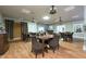 This common room has beautiful wood-look floors, neutral paint, and an abundance of tables and chairs at 3 Oceans West Blvd # 1D6, Daytona Beach Shores, FL 32118