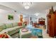 Living room with neutral wall color and tile floor at 3 Oceans West Blvd # 1D6, Daytona Beach Shores, FL 32118