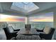Inviting outdoor seating area with fire pit table on a private balcony overlooking the ocean at 3000 N Atlantic Ave # 24, Daytona Beach, FL 32118