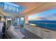 Cozy outdoor balcony with a fire feature and comfortable seating, providing stunning ocean views at 3000 N Atlantic Ave # 24, Daytona Beach, FL 32118