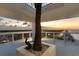 Relax on the balcony, featuring a palm tree and scenic water views at 3000 N Atlantic Ave # 24, Daytona Beach, FL 32118
