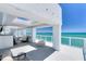 Spacious balcony with glass railings offering stunning ocean views and plenty of room for seating at 3000 N Atlantic Ave # 24, Daytona Beach, FL 32118