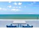 Balcony view showcasing blue chairs and stunning ocean views at 3000 N Atlantic Ave # 24, Daytona Beach, FL 32118