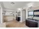 Luxurious bathroom with double vanities, a soaking tub, and stunning city views at 3000 N Atlantic Ave # 24, Daytona Beach, FL 32118