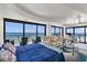 Spacious bedroom with floor-to-ceiling windows and ocean views at 3000 N Atlantic Ave # 24, Daytona Beach, FL 32118
