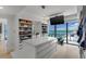 Spacious dressing room featuring abundant storage, tv and workout equipment at 3000 N Atlantic Ave # 24, Daytona Beach, FL 32118