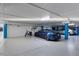 An indoor garage with multiple parking spots and charging capabilities at 3000 N Atlantic Ave # 24, Daytona Beach, FL 32118