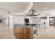 Spacious gourmet kitchen island features ample counter space, built in appliances and modern finishes at 3000 N Atlantic Ave # 24, Daytona Beach, FL 32118