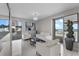 Bright living room with plush seating, stylish decor, and balcony access at 3000 N Atlantic Ave # 24, Daytona Beach, FL 32118