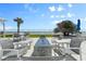 Community area featuring lounge seating and outdoor fire pit at 3000 N Atlantic Ave # 24, Daytona Beach, FL 32118