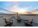 Relaxing rooftop deck with comfortable seating, offering panoramic views of the ocean and cityscape at 3000 N Atlantic Ave # 24, Daytona Beach, FL 32118
