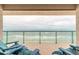 Oceanfront balcony featuring chairs, perfect for relaxing and enjoying the ocean breeze at 3315 S Atlantic Ave # 1106, Daytona Beach, FL 32118