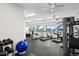 Well-equipped gym area with treadmills and weight machines overlooking ocean views at 3315 S Atlantic Ave # 1106, Daytona Beach, FL 32118