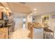 Contemporary kitchen boasts granite countertops, stainless steel appliances, and open layout at 3315 S Atlantic Ave # 1106, Daytona Beach, FL 32118