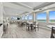 Spacious lounge area featuring tile floors, comfortable seating, and ocean views at 3315 S Atlantic Ave # 1106, Daytona Beach, FL 32118