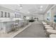 Bright lounge area with a bar, ocean views and comfortable seating at 3315 S Atlantic Ave # 1106, Daytona Beach, FL 32118