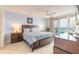 Spacious main bedroom with a king-size bed, private balcony access, and beautiful ocean views at 3315 S Atlantic Ave # 1106, Daytona Beach, FL 32118