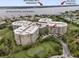 Beautiful aerial view of this condo building, overlooking a golf course and the Intracoastal Waterway at 4 Oceans West Blvd # 601A, Daytona Beach Shores, FL 32118