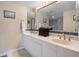 Bright bathroom with double sink vanity and walk-in glass shower at 4 Oceans West Blvd # 601A, Daytona Beach Shores, FL 32118