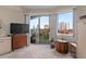 Bright bedroom with a balcony overlooking the city and ocean views at 4 Oceans West Blvd # 601A, Daytona Beach Shores, FL 32118