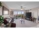 Comfortable living room with cityscape view and sliding door to balcony at 4 Oceans West Blvd # 601A, Daytona Beach Shores, FL 32118