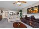 Open-concept living room with access to kitchen and comfortable seating at 4 Oceans West Blvd # 601A, Daytona Beach Shores, FL 32118