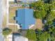 Aerial view of home showcasing blue roof, landscaping and layout at 408 Wisteria Rd, Daytona Beach, FL 32118