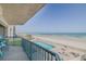 Expansive balcony view showcasing the ocean, pool, and beach for an ultimate resort experience at 4631 S Atlantic S Ave # 8201, Ponce Inlet, FL 32127