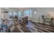 Bright dining room with decorative flooring, pendant lighting and ocean views at 4631 S Atlantic S Ave # 8201, Ponce Inlet, FL 32127